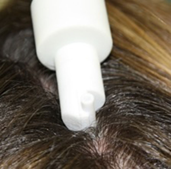 Tewameter® Nano - TEWL measurement on the scalp between hair